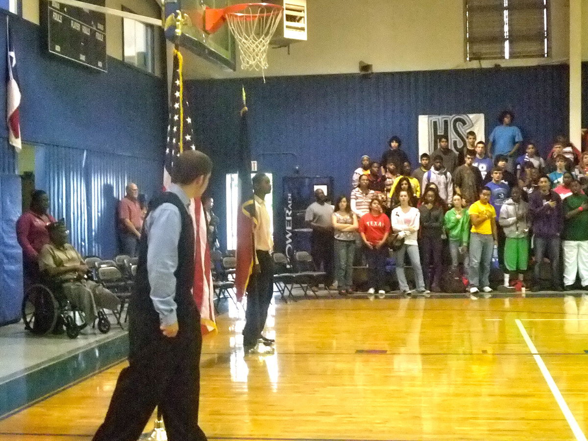 Image: Posting of the Colors — Tri-M Student Honor Guard carrying the flags.