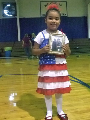 Image: Patriotic Dress — This little cutie displayed her “flag dress”.