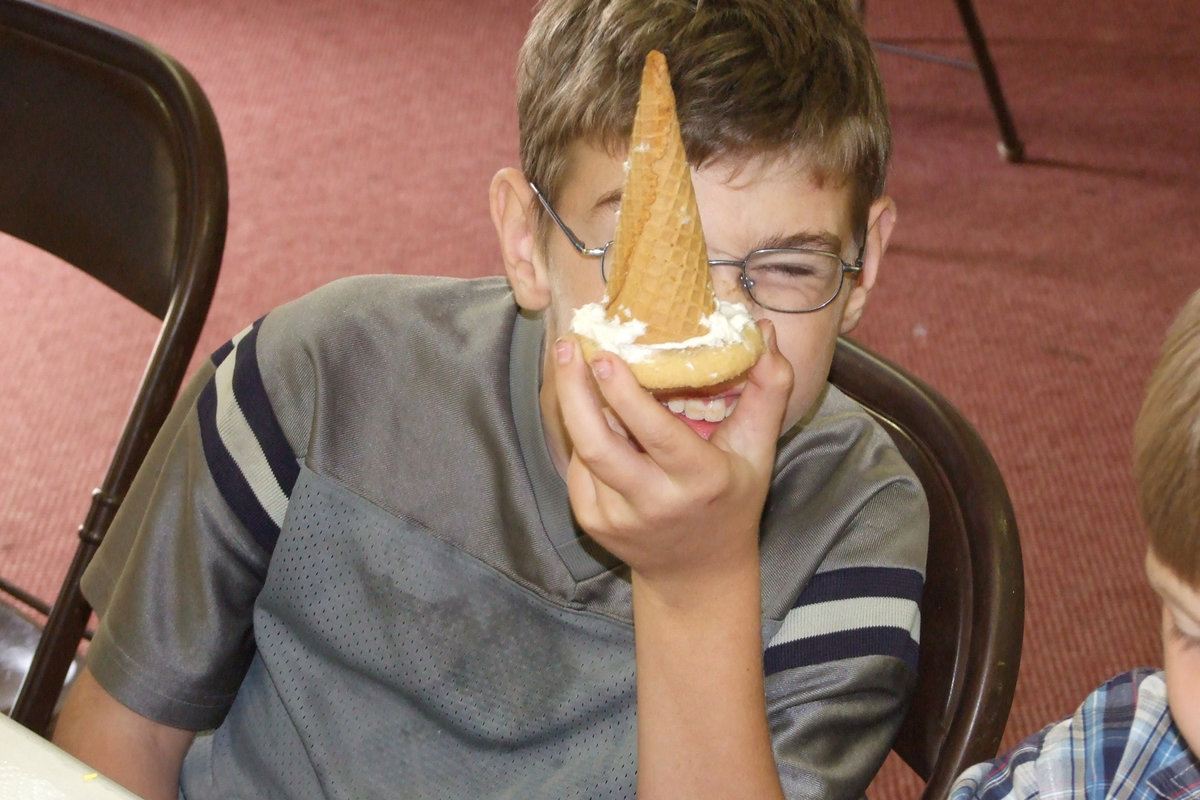 Image: James made a hat — James Youngblood has created his fun hat with a cookie, frosting and an ice cream cone.