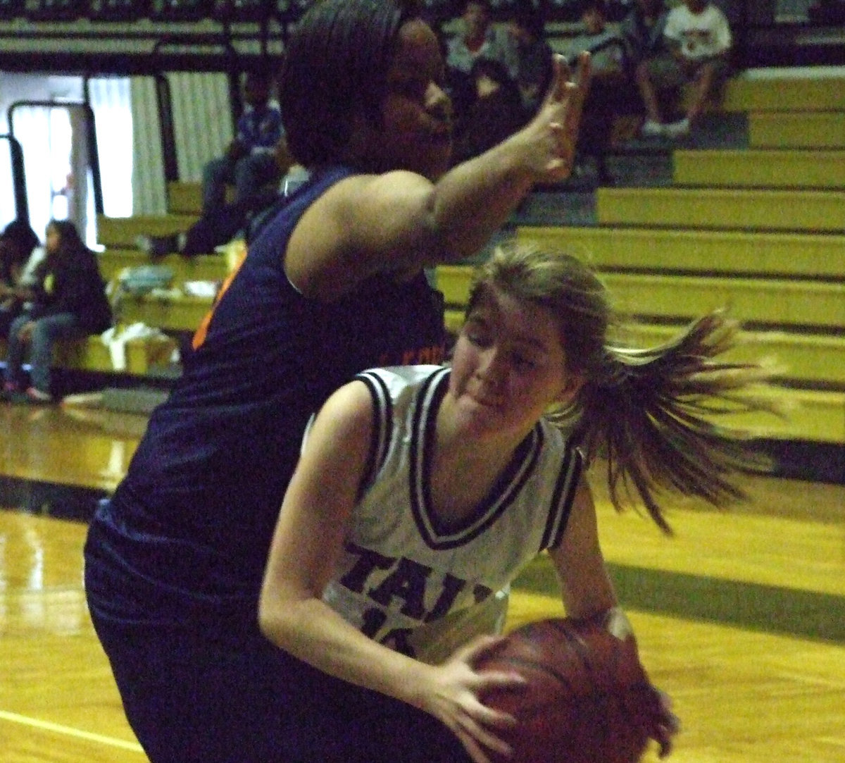 Image: Turner Goes Straight In — Taylor Turner #14 powers her way through the heart of the Phoenix defense.