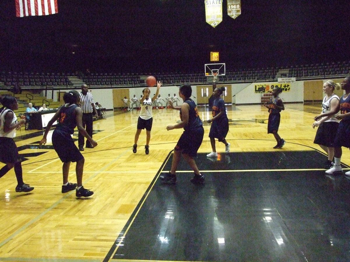 Image: Copeland Shoots — Italy’s #4 Ryisha Copeland rockets a shot at the goal.