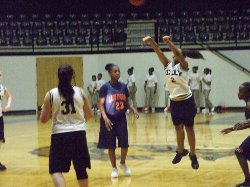 Image: Letting It Fly — Italy’s #2 Bernice Haley let’s it fly against the Phoenix.