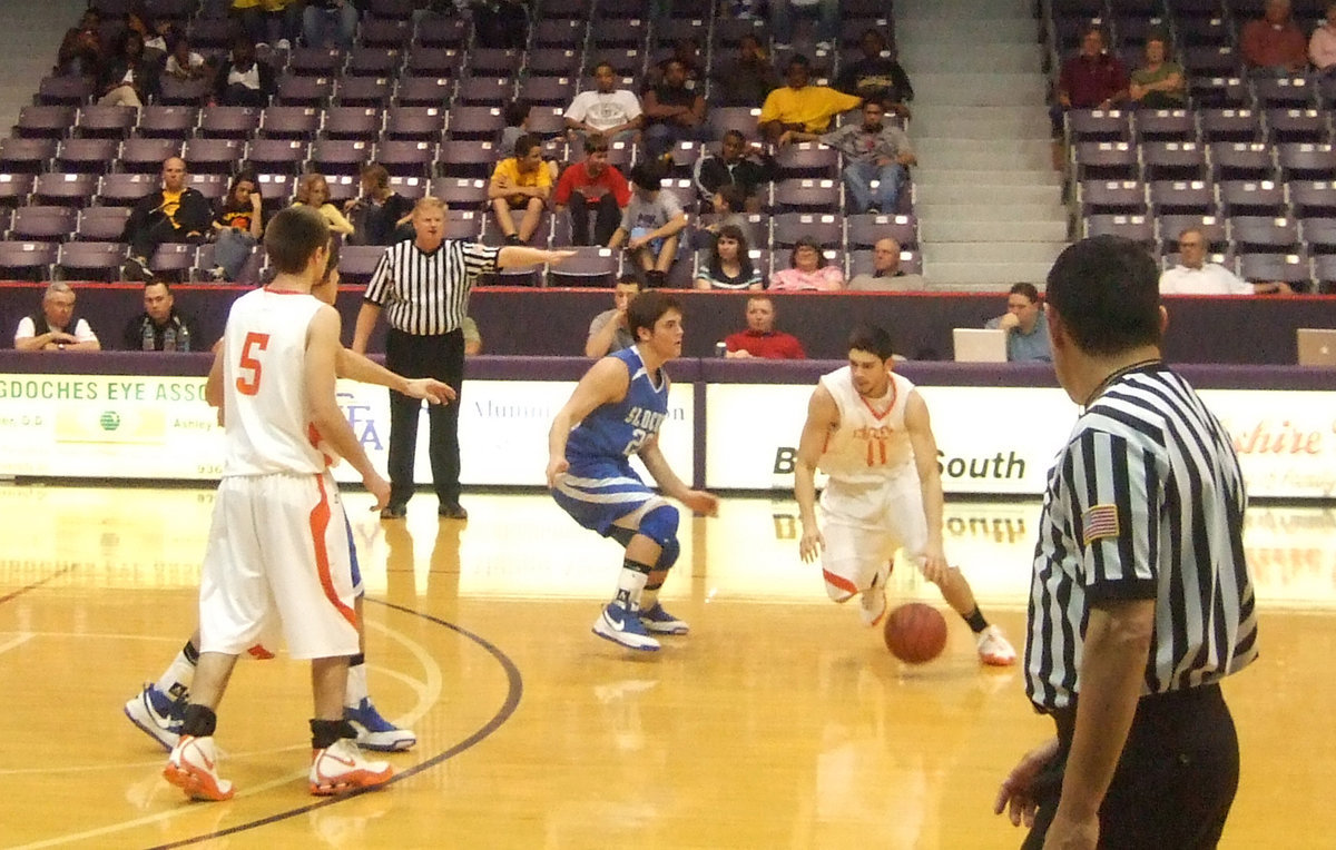 Image: Romero Dribbles — Andrew keeps the ball moving while trying to set up a play.