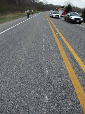 Image: Marks in the road — Surface scratches were evident down the road way.