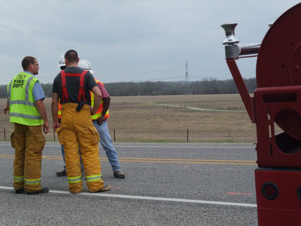 Image: Italy fire crews organize — Italy fire crews organize with the Department of Transportation.