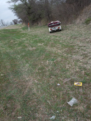 Image: Trailer in ditch — The trailer finally stalled in the ditch well beyond the motorcycle.