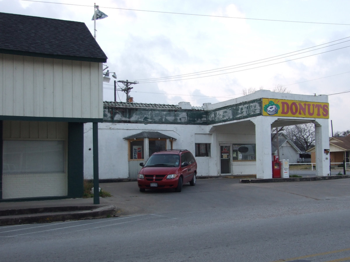 Image: Customers Leaving Empty Handed — Many will miss the Italy Donut shop.