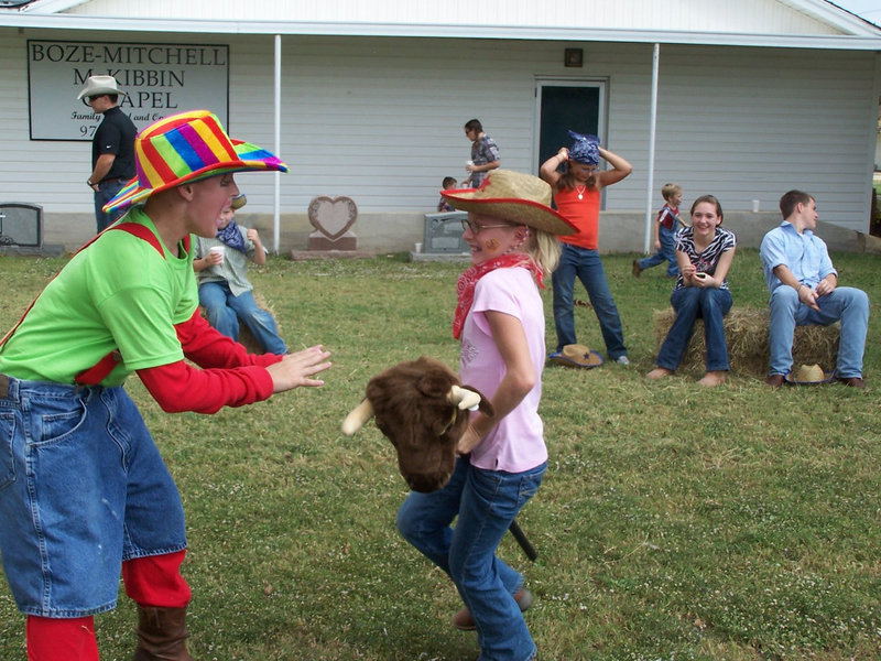 Image: I gotcha — Clay and and his sister square off.