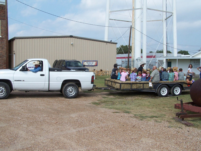 Image: Let’s go — Randy Muirhead drove the cowboys and cowgirls around, until the horses got tired.