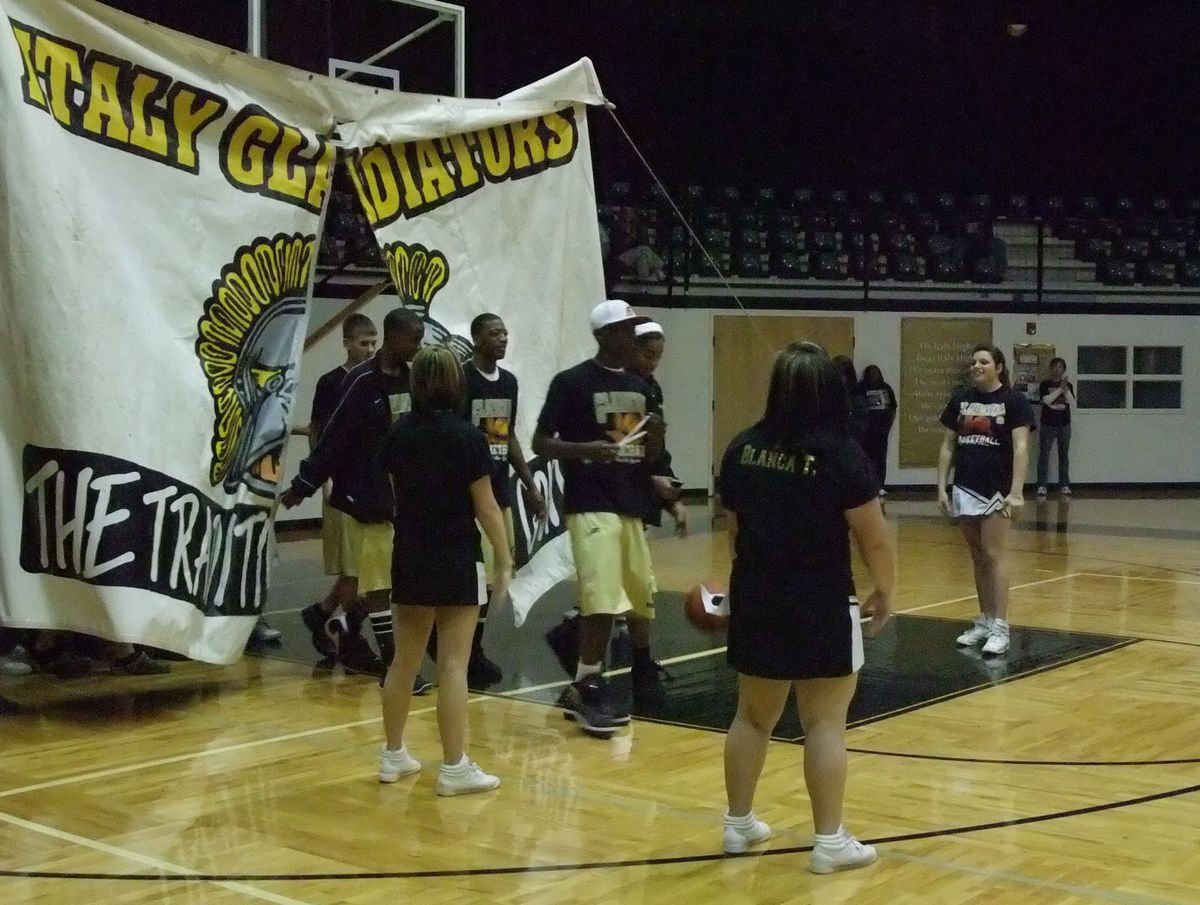 Image: Walking into history — The Italy Gladiators are strolling toward State. The City of Italy, the Italy Schools, fans and shop owners are adjusting their schedules to support the boys in Abilene for Regionals.