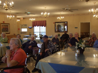 Image: Trinity Mission Residents — Residents enjoying the old hymns.