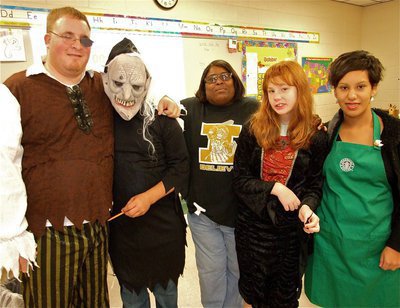 Image: Boo! — The C.B.I. &amp; Life Skills Class participated on Halloween dress-up day as well. Pictured are: Mr. Michael Destafani, Blake Vega, Brenda Davis, Kathie Conner and Morgan Martinez.