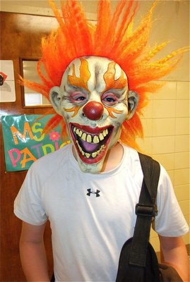 Image: Clownstatic — John Escamilla feels like clowning around.