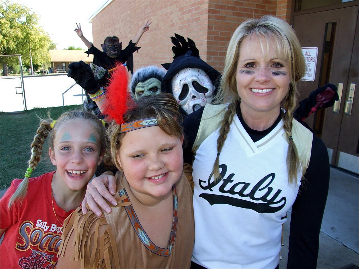 Image: Back to gule! — Stafford Elementary teacher Kim Nelson looks scared as she is suddenly surrounded by creepers and little monsters.