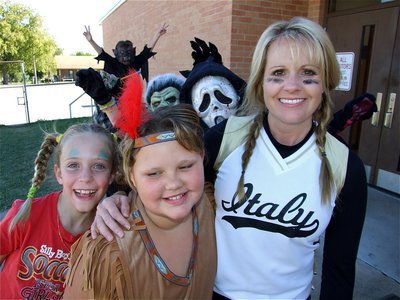 Image: Back to gule! — Stafford Elementary teacher Kim Nelson looks scared as she is suddenly surrounded by creepers and little monsters.