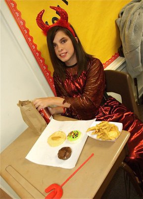 Image: What, no deviled ham? — Aaron enjoys a spooky snack on Halloween dress-up day at Italy’s Stafford Elementary.