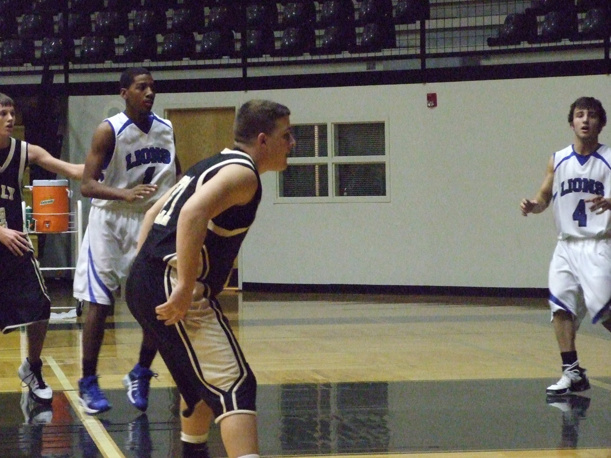 Image: Saxon Digging In — Italy’s #21 Ethan Saxon dares a Blooming Grove player to cross the line.