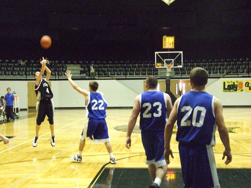 Image: Jase Pulls Trigger — Coach Mayberry’s right pistol #4 Jase Holden (6-points) aims for the target against Rice.