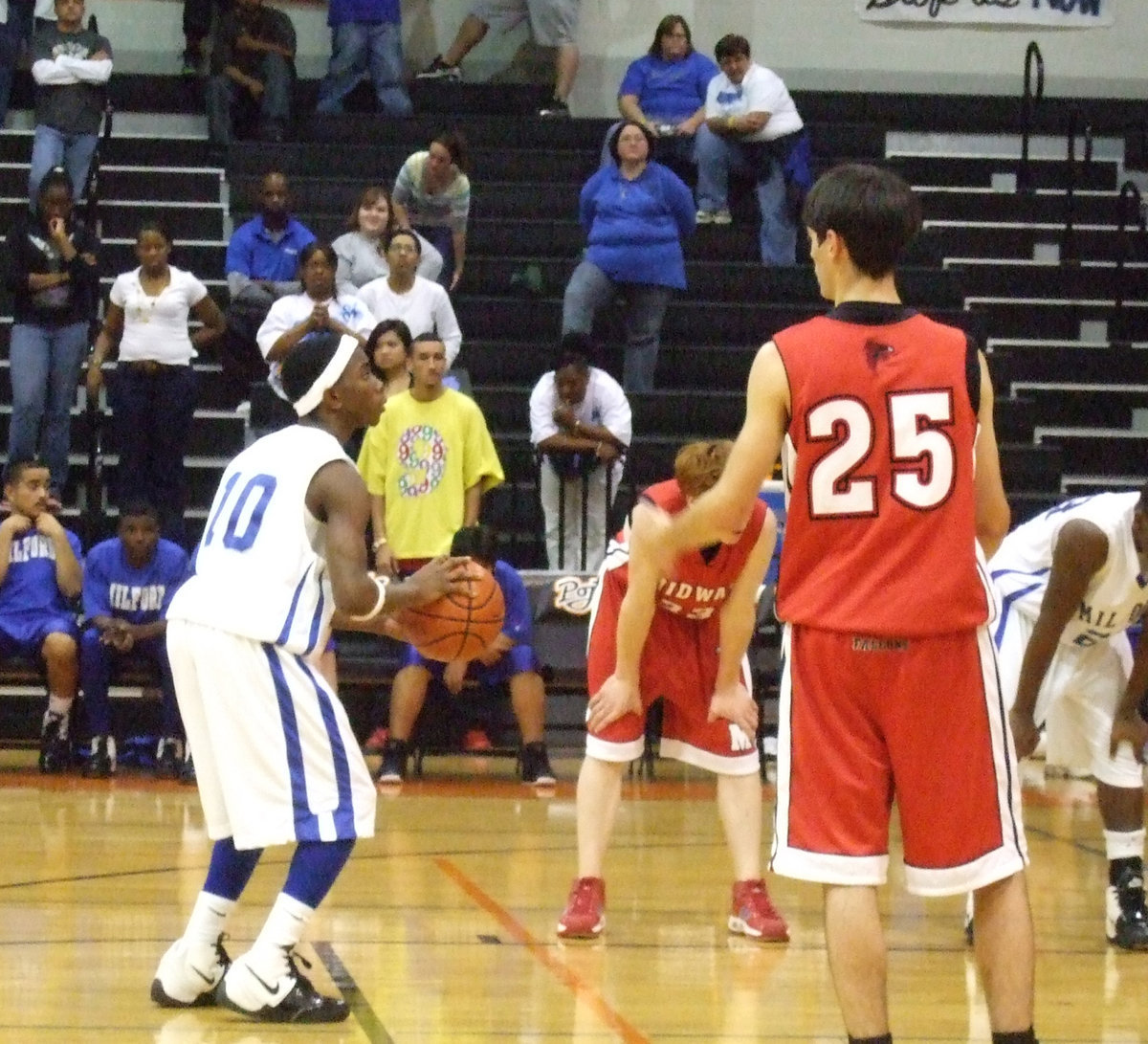 Image: Davis delivers — Milford’s #10 Davis helped seal the deal against the Midway Falcons as the “Boys in Blue” hit 8-of-12 free-throws from the line in the fourth quarter.