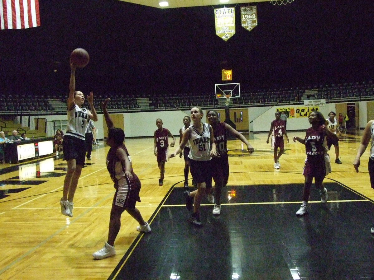 Image: Paola Mata Is Money — Italy’s #2 Paola Mata hits this beautiful running jumper against the Red Oak Faith Family Lady Eagles Thursday inside the dome. A relentless Italy squad won the game 47-6.