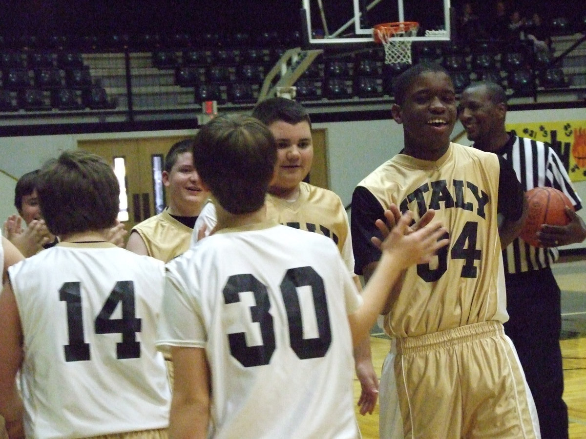 Image: All Smiles — It was all smiles after the competitive scrimmage between teammates, classmates and friends.