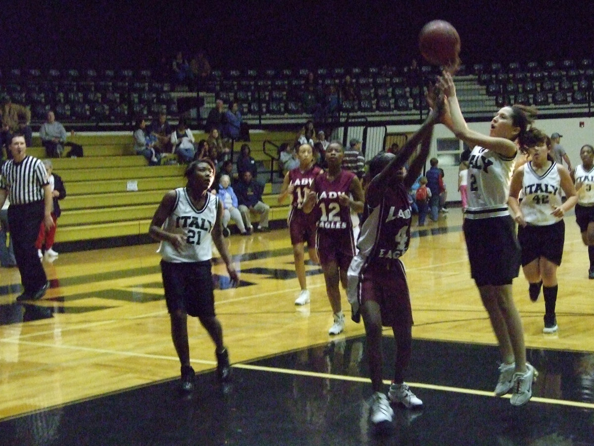 Image: Mata Makes It — Italy’s #2 Paola Mata scores 2-more points for the Lady Gladiators JH.