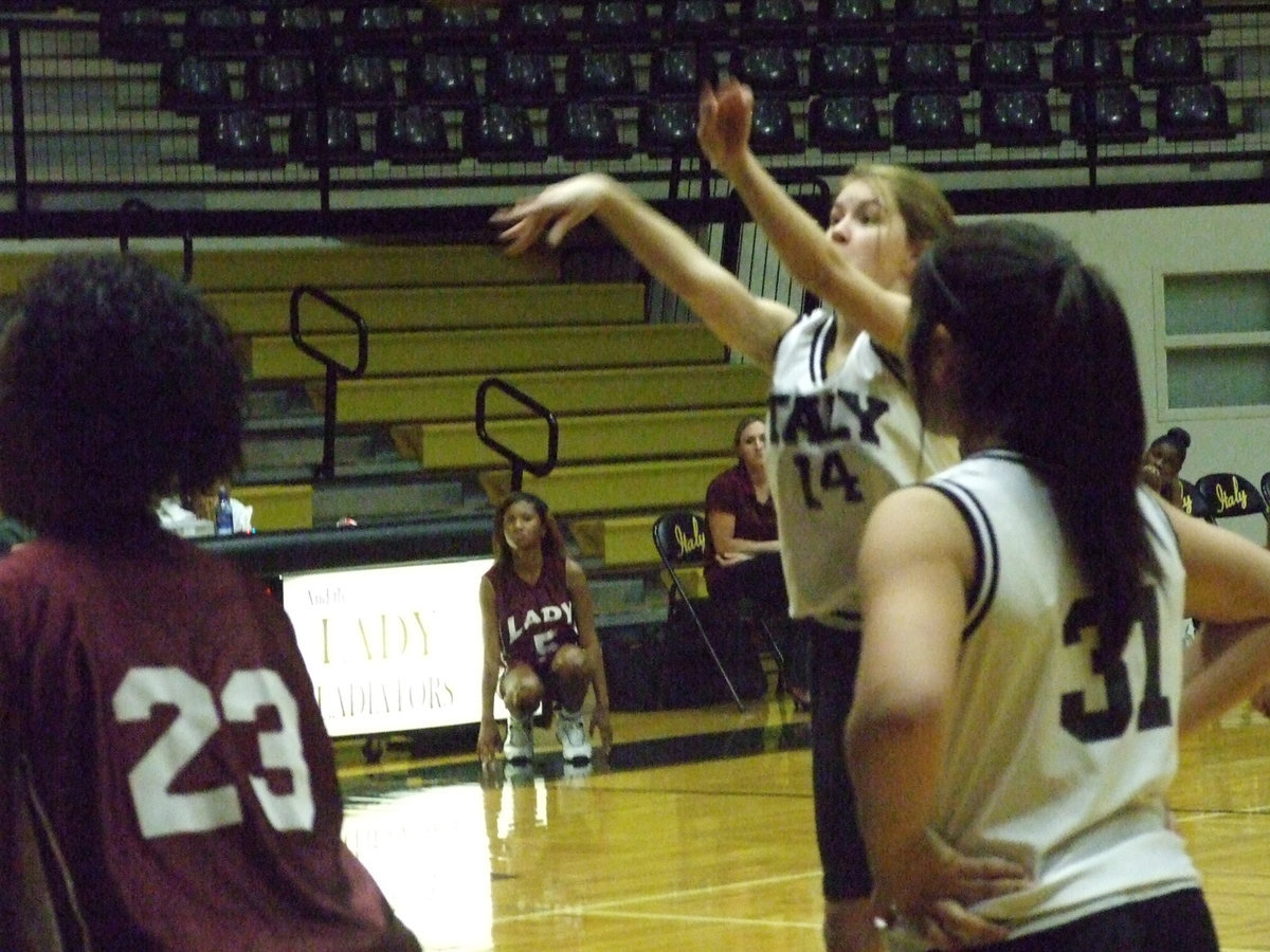 Image: Turner For One — Italy’s #14 Taylor Turner tries to add another point from the free-throw line.