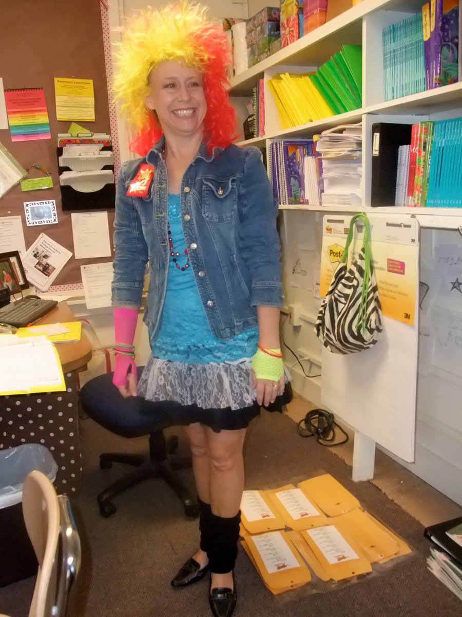 Image: Cyndi Lauper — Jane Medrano, 5th grade math teacher gets into the swing of things for “Dress like your favorite recording artist” day for the first day of Red Ribbon week.