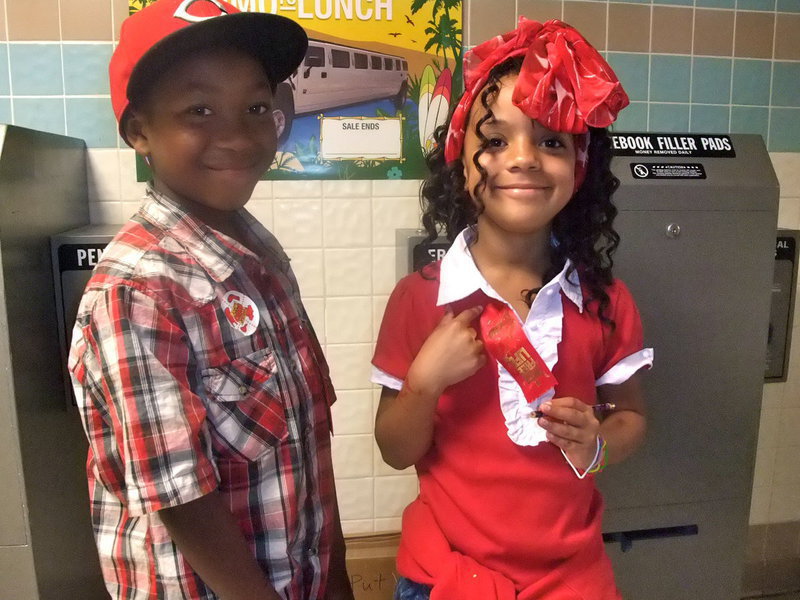 Image: More Red — Zorian Burley and Aliyah Turner are showing off their red!