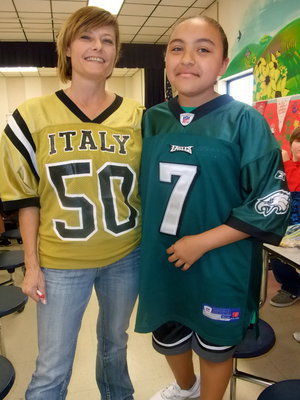 Image: Ramona &amp; Vanessa — Ramona Simon (aide) and Vanessa Caantu (sixth grade) showing off their jerseys.