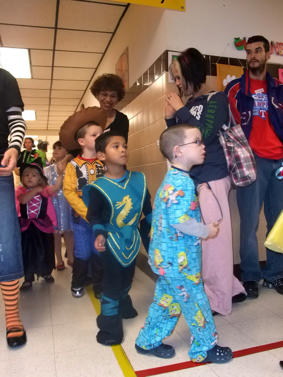 Image: Halloween Parade  — Stafford students wearing their costumes for the Halloween parade.