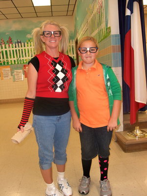 Image: Angie and Brycelen — Angie Janek (fifth grade math teacher) and Brycelen Richards (fifth grader) having fun posing as nerds for nerd day.