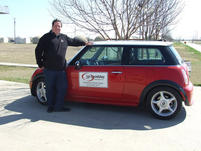 Image: Bright Red Mini Cooper — Joe Lumbley (rally master) and his Mini Cooper.