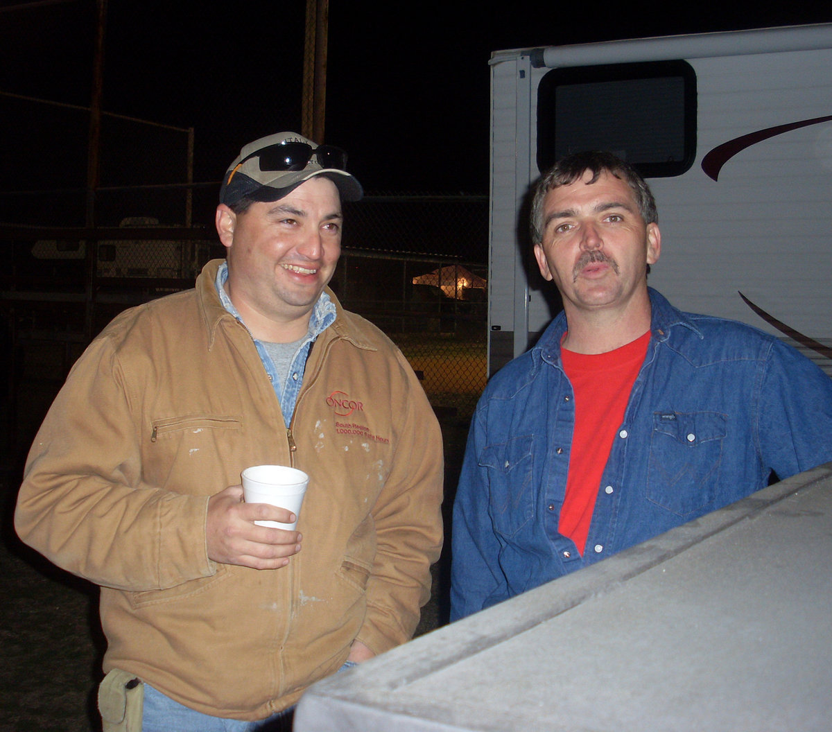 Image: Steamwork — Gary Wood (on the right) and Jason Escamilla monitor the grill overnight at Upchurch Field. Gary Wood won 2nd place in the  “Local Bragging Rights.” category  that was a contest just for Italy cookers only.