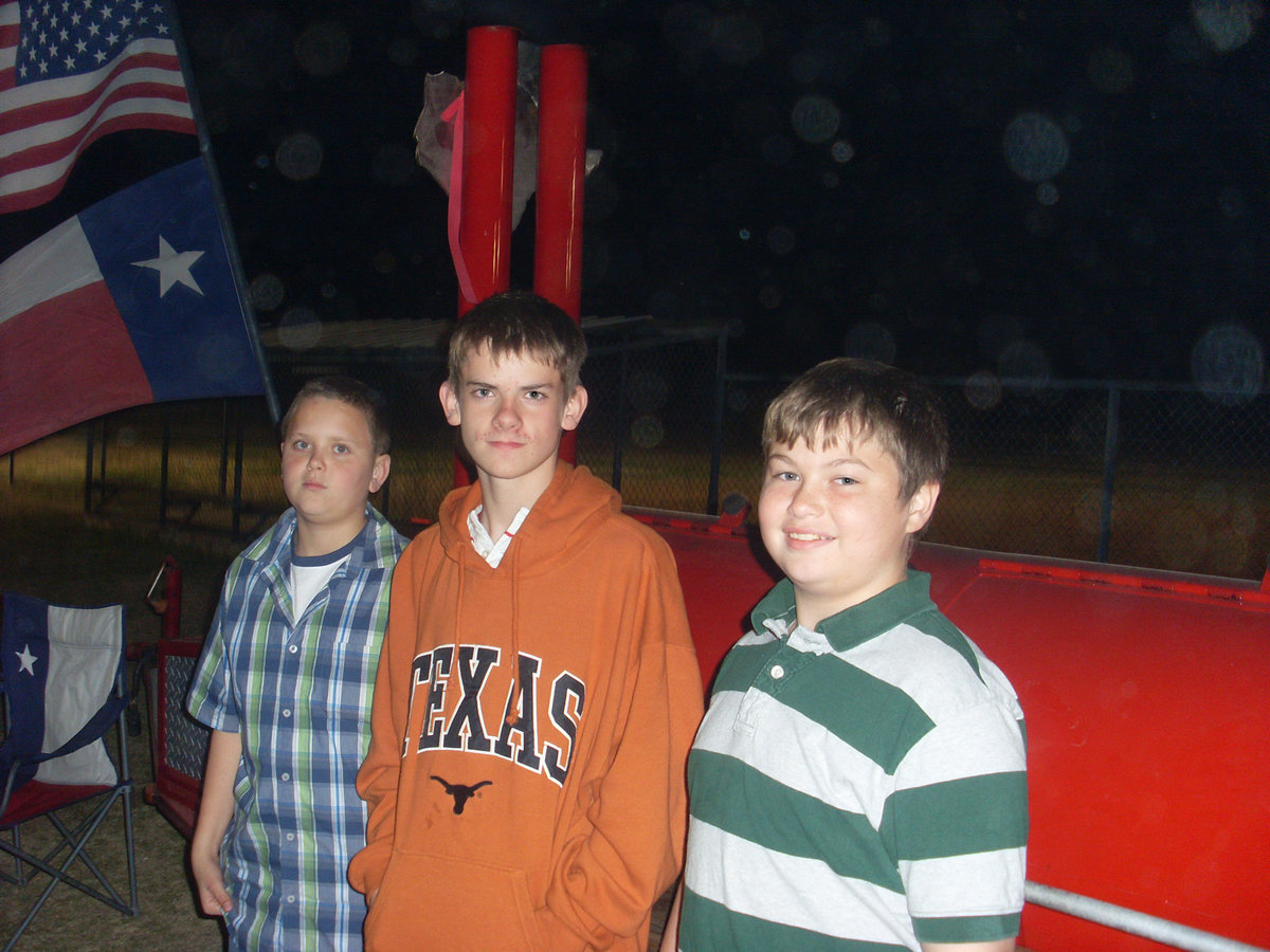 Image: We found it! — Bailey Walton, Justin Wood and Zain Byers have a nose for BBQ. The event even attracted BBQ eaters from out-of-state.