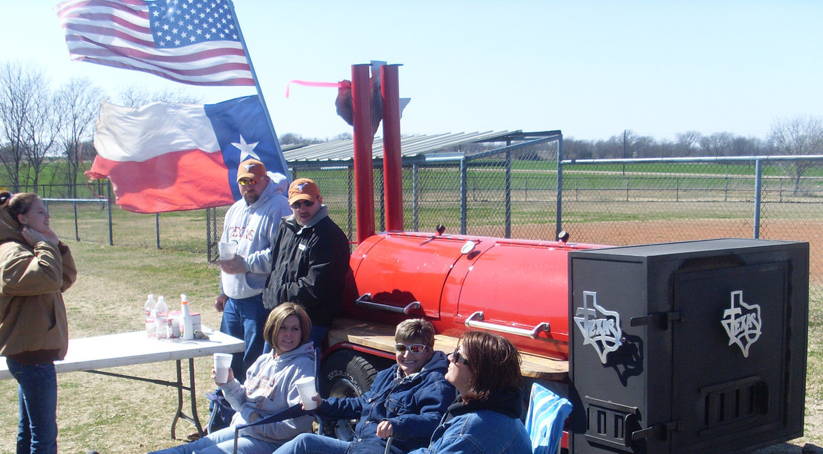 Image: Enjoying the day — Enjoying the day with Gary Wood are his friends and family.