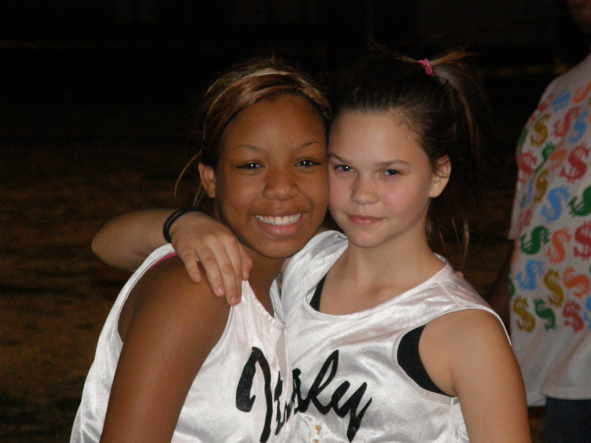 Image: Ryisha and Corl — Meet 7th Grade Tracksters, Ryisha and Corl. Matching custom tanks, $20.00.  Hair ribbons, $3.00. Friends for life, Priceless.