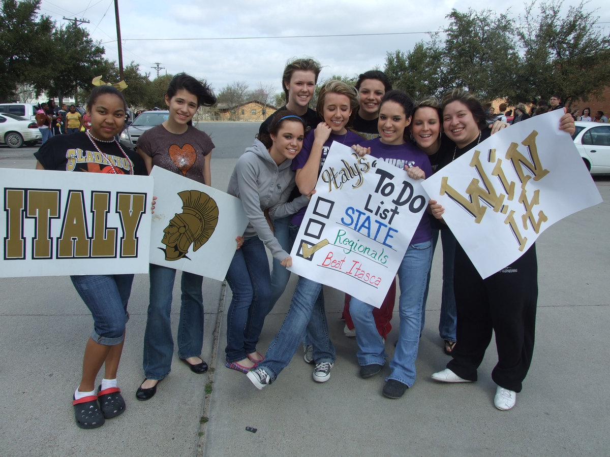 Image: IHS Cheerleaders — Making the list and checking it twice.