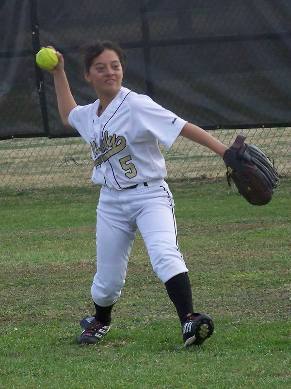 Image: Lupita Luna — “Pita” during outfield warm-ups.
