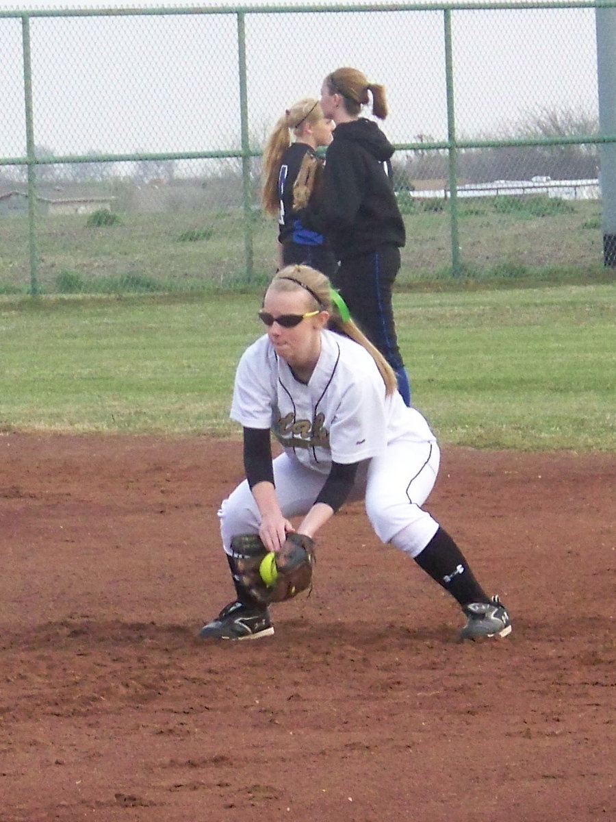 Image: Abby Griffith — “Abby-G” takes ground balls before the game.