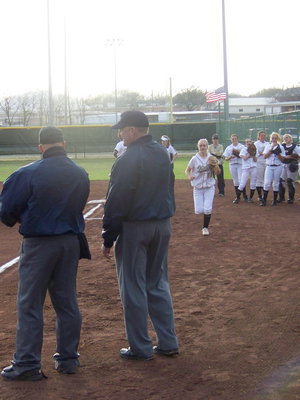 Image: Introductions — Lead off batter and starting pitcher, Courtney Westbook, is introduced before the game.