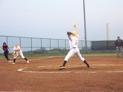 Image: Defensive position — Courtney is ready for anything as Megan strides out during her pitch.