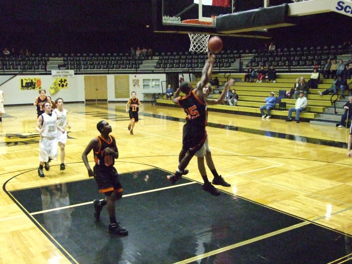 Image: Campbell Clobbered — Colton Campbell gets clobbered by a Ferris defender.