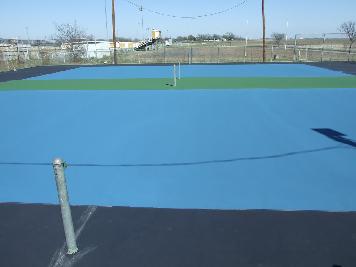 Image: New tennis court — The tennis court has been refurbished with a local donation.