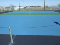 Image: New tennis court — The tennis court has been refurbished with a local donation.
