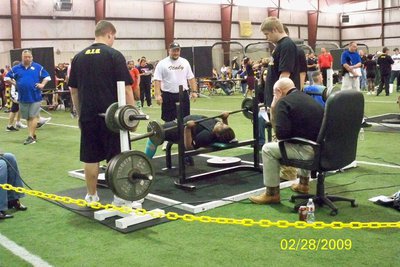 Image: Sa’Kendra raises the bar — Sa’Kendra Norwood is in midlift at Regionals in Forney, Texas.
