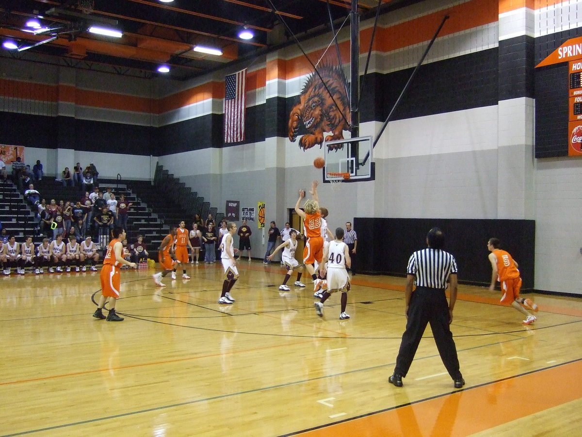 Image: 
    	Knight — Even with a defender on him, Knight makes his jump shot.
    