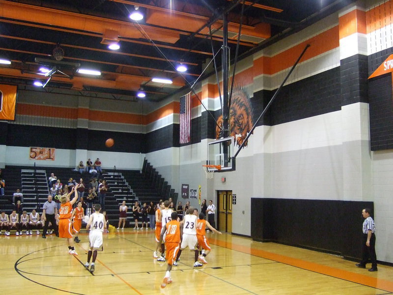 Image: Knight Shoots — #22 Jeremy Knight takes an open shot at the free-throw line.