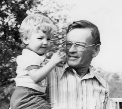 Image: First Time Grandpa — Charles Adams holding his grandson Toby Adams.