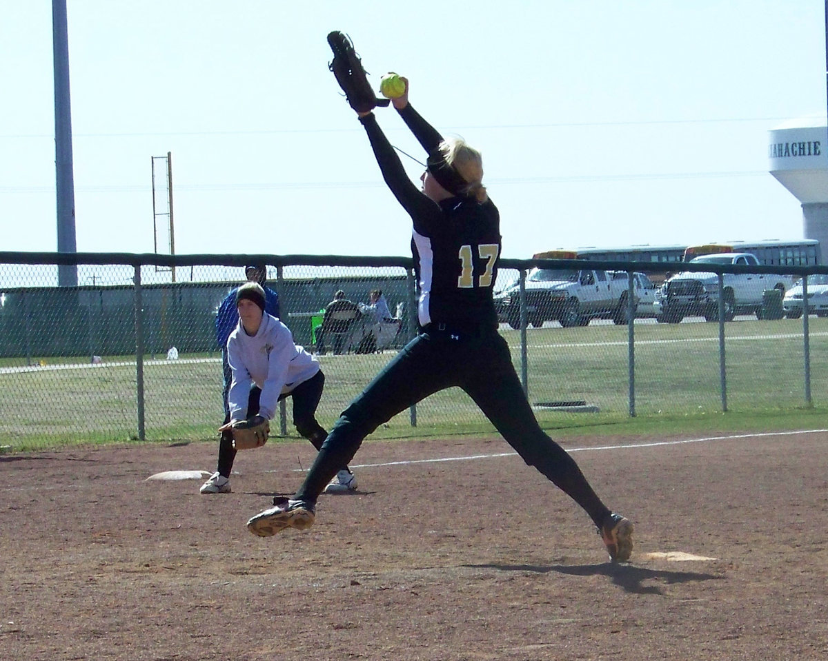 Image: Freshman Lady Gladiator Megan “Rich” Richards — With perfect form and precision the Lady Gladiator Softball team went 5 and 1 in The Classic of Ellis County softball tournament as illustrated by Megan Richards on the mound while Courtney Westbrook shows the defensive “ready” position on third base.